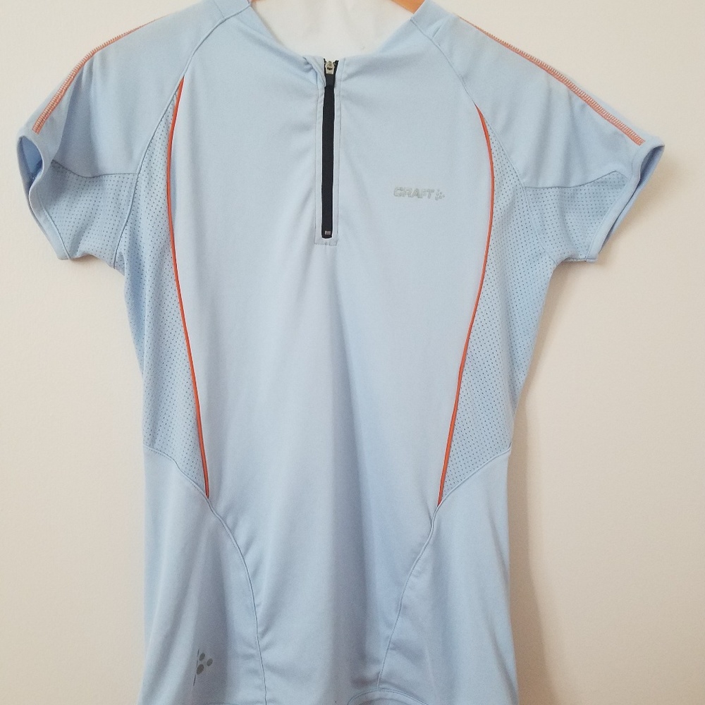 Light blue light weight cycling top